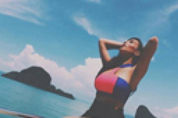 بالصور: المعجبون يفضحون كذب كيم كارداشيان خلال إجازتها في تايلاند!