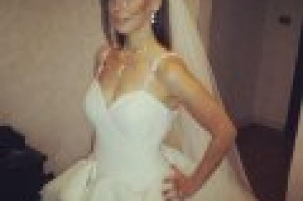 بالصور: إيمان العاصي بفستان الزفاف في كواليس فيلم "حماتي بتحبني"