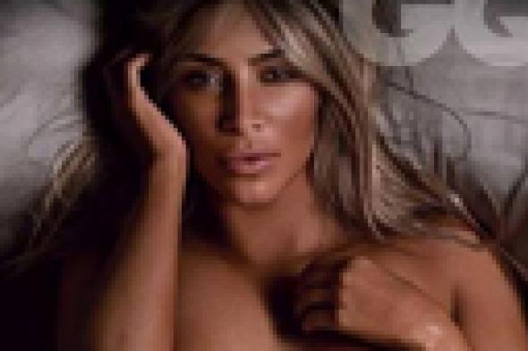 كيم كارداشيان تتعرى احتفالا بتتويجها "إمرأة العام" في 2014!