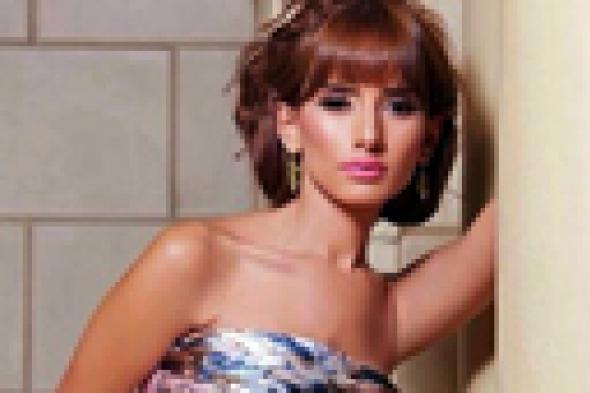 صورة- زينة تحتفل بعيد ميلاد توأمها دون والدهما