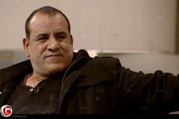 محمد لطفي ينشر صورته مع محمد علي كلاي