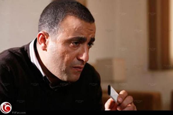 صورة - أحمد السقا بصحبه ابنه ياسين في مبارة كرة قدم