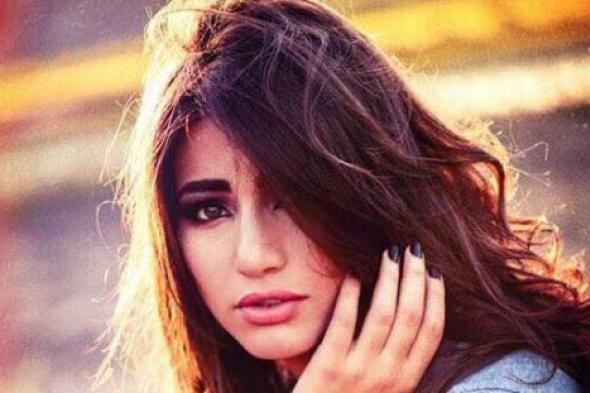 بالصور- هايدي موسى في جلسة تصوير جديدة مع كلب "هاسكي"