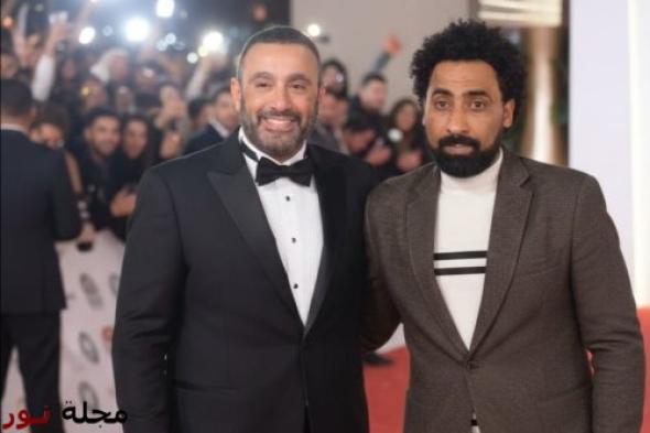 المخرج أحمد بوجي والفنان أحمد السقا خلال حفل فني